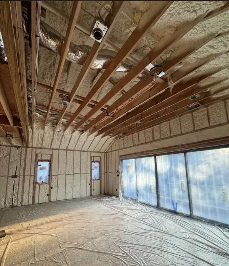 Interior walls and ceiling insulated with spray foam during new construction in Lancaster