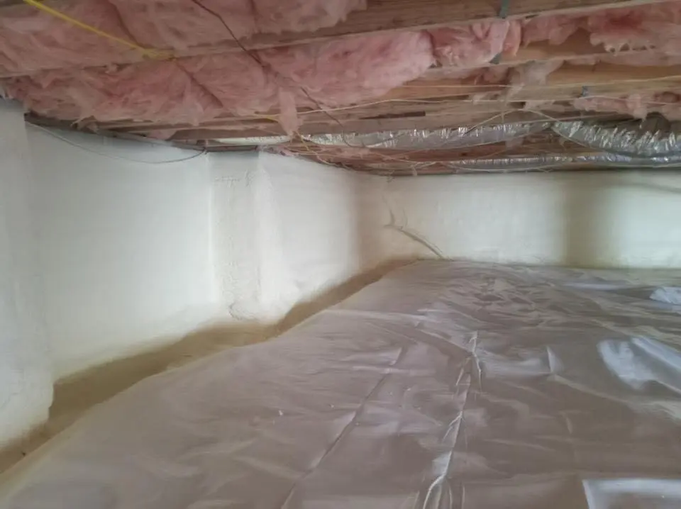 Crawl space encapsulation with closed-cell spray foam for Commercial Roof Restoration in Lancaster